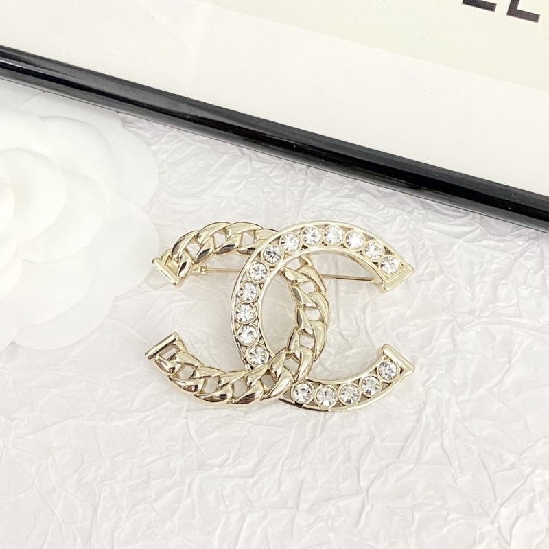 Ch*el brooches